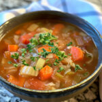 Cabbage Soup Crockpot taken with iphone 15 pro max --iw 2 --ar 4:5 --v 6.0 --raw