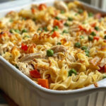 Creamy Chicken Noodle Casserole taken with iphone 15 pro max --iw 2 --ar 4:5 --v 6.0 --raw